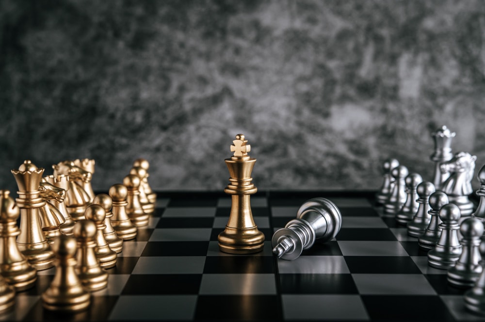 gold silver chess chess board game business metaphor leadership concept